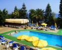 Relax under the sun by the pool at the Adonia Beach Hotel