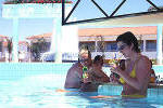 Relax with a drink at the pool bar of the Faros Hotel in Ayia Napa
