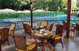 Enjoy a refreshing drink along side the Pool at the Kanika Pantheon Hotel in Limassol