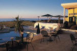 Enjoy a cold drink looking out at the horizon at the Natura Beach Hotel