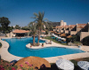 Palm Beach Hotel Swimming Pool with Garden Suites on the Right. Click to enlarge this photograph