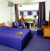 Petrou Bros Hotel Apartments bedroom, click to enlarge this photograph
