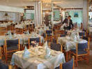 Enjoy speciality meals in the luxurious restaurant at the Sunrise Beach Hotel