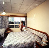 Sunsmile Hotel Apartments Bedroom, click to enlarge this photograph